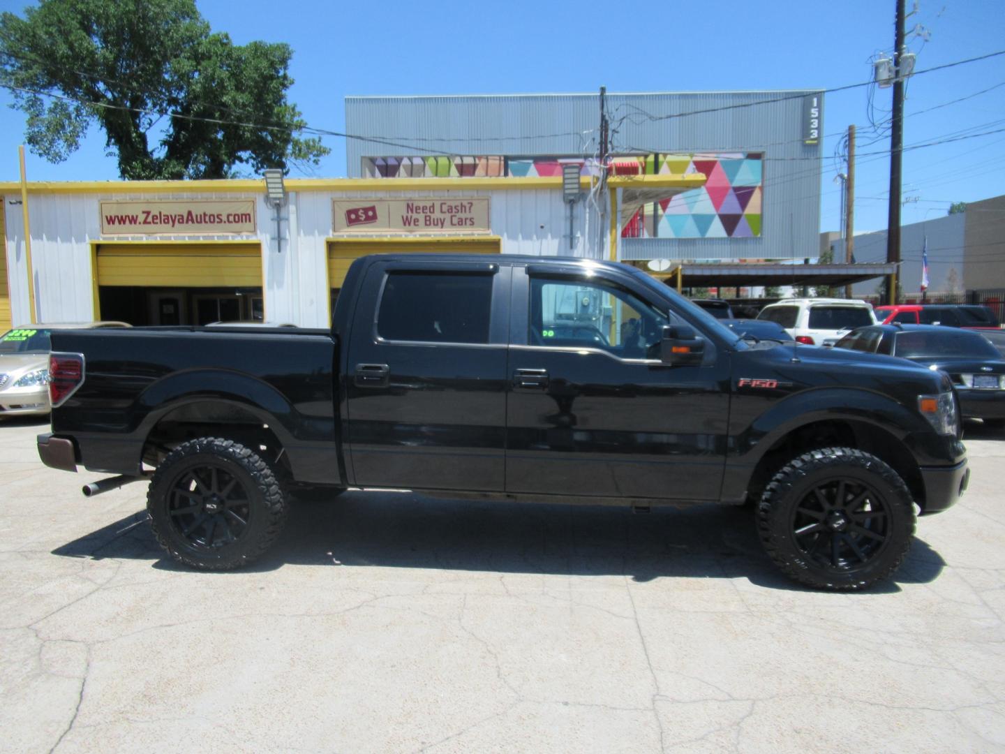 2012 Black /Black Ford F-150 FX2 SuperCrew 5.5-ft. Bed 2WD (1FTEW1CM7CK) with an 3.7L V6 DOHC 24V engine, Automatic transmission, located at 1511 North Shepherd Dr., Houston, TX, 77008, (281) 657-1221, 29.798361, -95.412560 - 2012 FORD F-150 XLT VIN: 1FTEW1CM7CKE33655 1 F T E W 1 C M 7 C K E 3 3 6 5 5 CREW PICKUP 3.7L V6 F DOHC 24V FLEX FUEL REAR WHEEL DRIVE - Photo#0